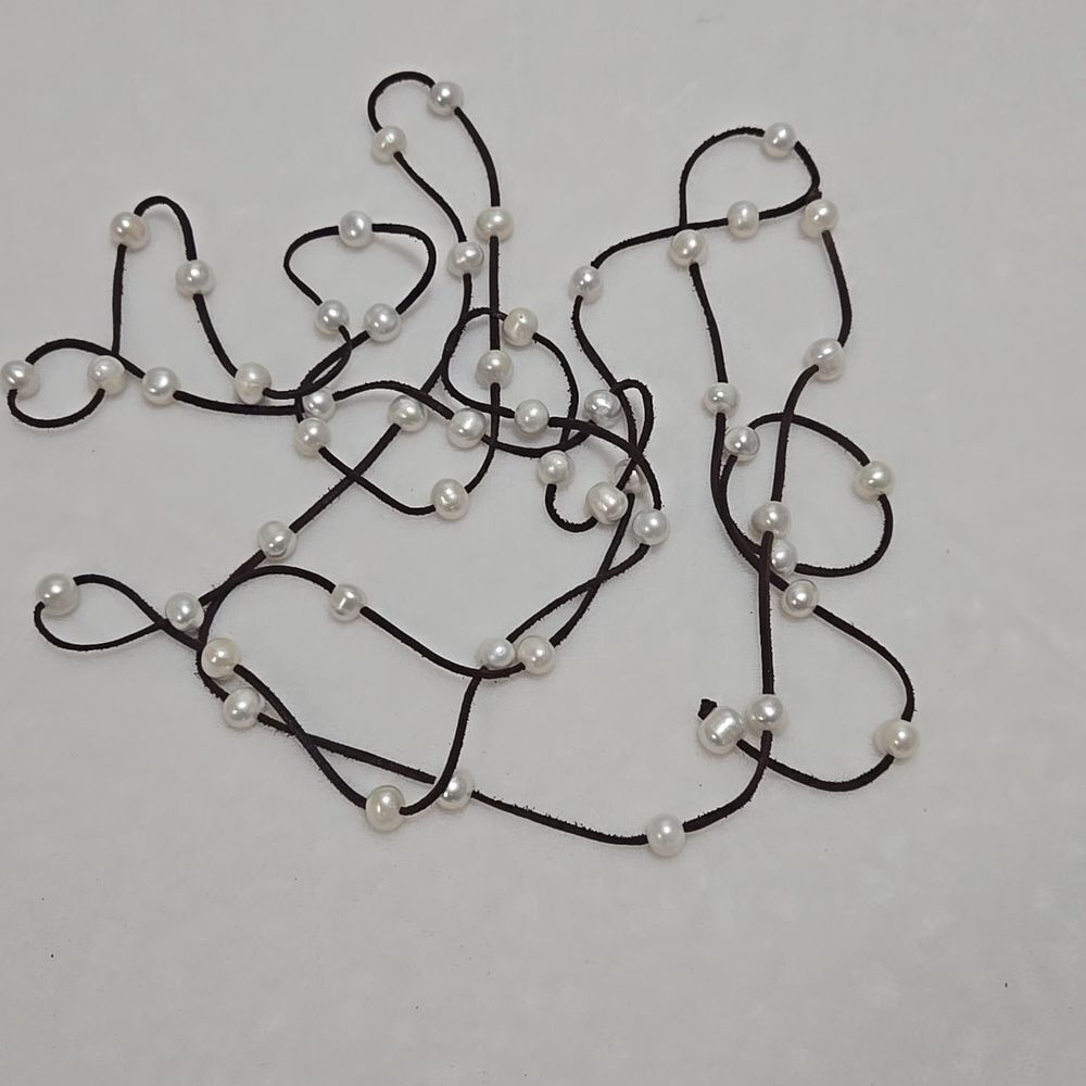 52 Natural Pearls On 9 Ft Suede Rope